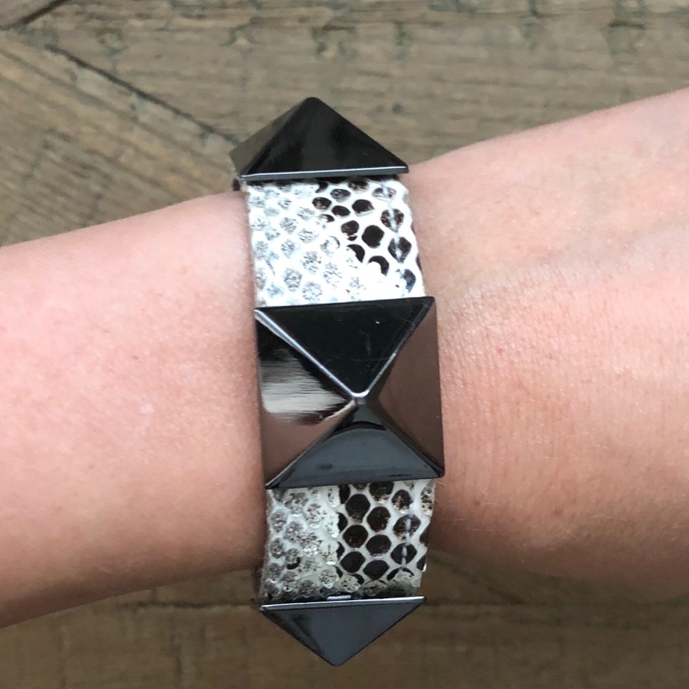 Leather studded bracelet by Ted Rossi.